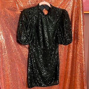 Camila Coelho green sequin mini dress.